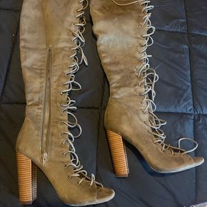 Thigh high lace up boots